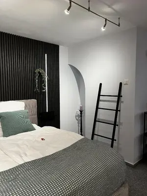 Ein Bett oder Betten in einem Zimmer der Unterkunft Ein Traum im Turm, historischer Wasserturm Worms