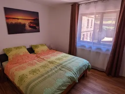 Ein Bett oder Betten in einem Zimmer der Unterkunft Holiday apartment with 1 bedroom