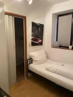 Ein Bett oder Betten in einem Zimmer der Unterkunft Zum Burggraf