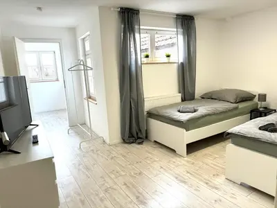 Ein Bett oder Betten in einem Zimmer der Unterkunft Monteurszimmer Renix Heilbronn