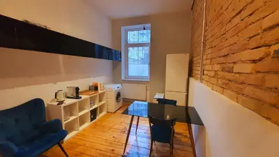 Ein Sitzbereich in der Unterkunft Zimmer im Erdgeschoss
