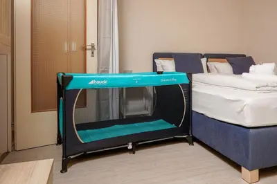 Ein Bett oder Betten in einem Zimmer der Unterkunft Gemütliche 2-Zi-Whg mit Balkon im Süden von HD