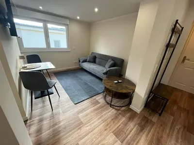 Ein Sitzbereich in der Unterkunft Lumio Apartment 2