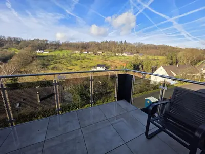 Ein Balkon oder eine Terrasse in der Unterkunft Malerischer Panoramablick Worgberg
