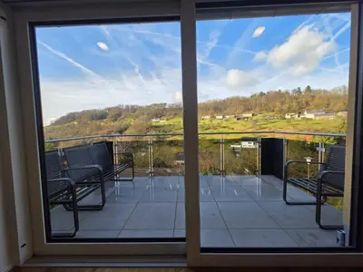 Ein Balkon oder eine Terrasse in der Unterkunft Malerischer Panoramablick Worgberg