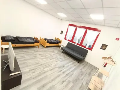 Ein Sitzbereich in der Unterkunft Lumara Apartment Modern temporary living