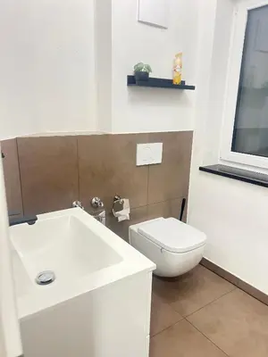 Ein Badezimmer in der Unterkunft Suite Fortuna