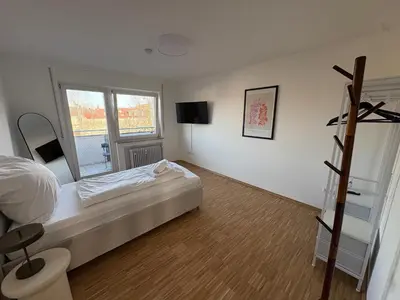 Ein Bett oder Betten in einem Zimmer der Unterkunft Altstadtperle Ettlingen mit Smart TV und WLAN