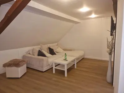 Ein Sitzbereich in der Unterkunft Janna's City Appartement