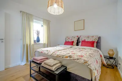 Ein Bett oder Betten in einem Zimmer der Unterkunft ERB03 Apartment Wohlgefühl
