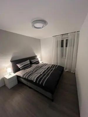 Ein Bett oder Betten in einem Zimmer der Unterkunft Ferienwohnung zum Kriegerdenkmal