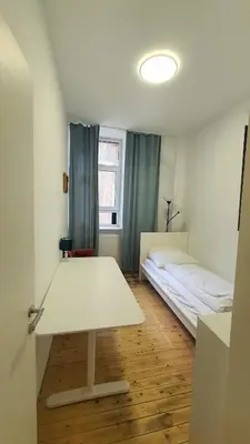 Ein Bett oder Betten in einem Zimmer der Unterkunft Zimmer im Erdgeschoss