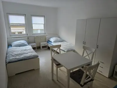 Ein Bett oder Betten in einem Zimmer der Unterkunft Monteurzimmer Monteurwohnung Monteurünterkunft in Ludwigshafen