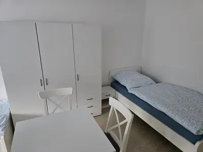 Ein Bett oder Betten in einem Zimmer der Unterkunft Monteurzimmer Monteurwohnung Monteurünterkunft in Ludwigshafen