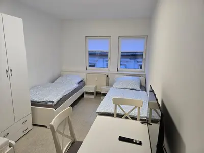 Ein Bett oder Betten in einem Zimmer der Unterkunft Monteurzimmer Monteurwohnung Monteurünterkunft in Ludwigshafen
