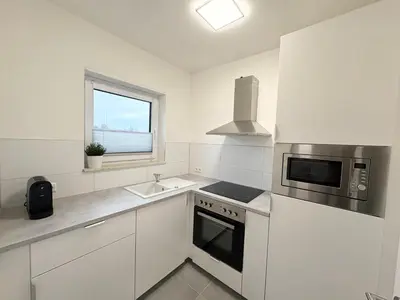 Küche/Küchenzeile in der Unterkunft HUGOS Design Apartment