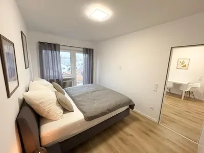 Ein Bett oder Betten in einem Zimmer der Unterkunft HUGOS Design Apartment