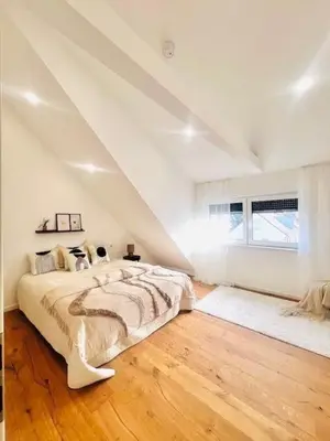 Ein Bett oder Betten in einem Zimmer der Unterkunft Modernes Wohnerlebnis in Mainz kernsanierte 3-Zimmer-Wohnung