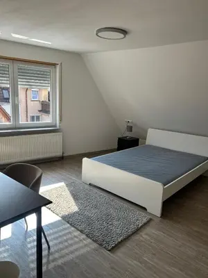Ein Bett oder Betten in einem Zimmer der Unterkunft Deans Home