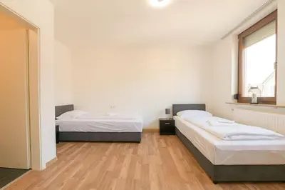 Ein Bett oder Betten in einem Zimmer der Unterkunft G Living Klingenberg153 City und Work Apartment