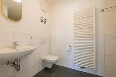 Ein Badezimmer in der Unterkunft G Living Klingenberg153 City und Work Apartment