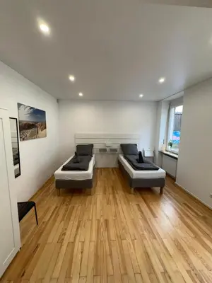 Ein Bett oder Betten in einem Zimmer der Unterkunft Central City Apartment Mozart