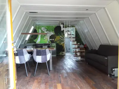 Ein Sitzbereich in der Unterkunft Holiday Home Freistehendes Nurdachaus im Ferienpark Schellbronn by Interhome