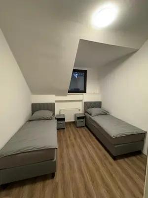 Ein Bett oder Betten in einem Zimmer der Unterkunft Monteurwohnung Neustadt an der Weinstraße