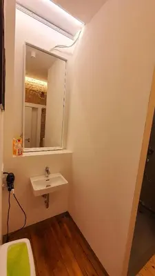Ein Badezimmer in der Unterkunft Zimmer im Erdgeschoss II