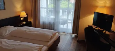 Ein Bett oder Betten in einem Zimmer der Unterkunft Hotel am Theater