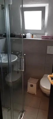 Ein Badezimmer in der Unterkunft Hotel am Theater