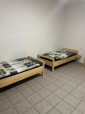 Ein Bett oder Betten in einem Zimmer der Unterkunft Unterkunft für Monteure, ruhige Lage nahe dem Zentrum