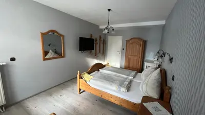 Ein Bett oder Betten in einem Zimmer der Unterkunft Weingut Günther und Gästezimmer