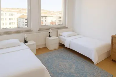 Ein Bett oder Betten in einem Zimmer der Unterkunft Nice stay long term