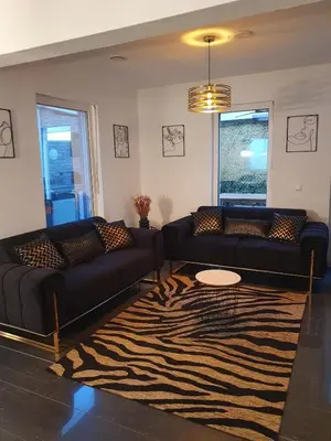 Ein Sitzbereich in der Unterkunft Karlsruhe Holiday & Business Apartment - 3-Bedroom House