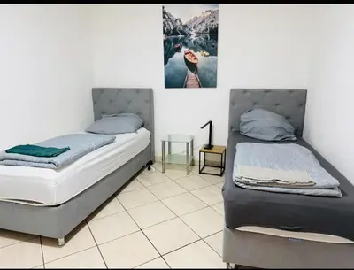 Ein Bett oder Betten in einem Zimmer der Unterkunft House AL11