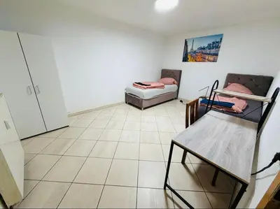Ein Sitzbereich in der Unterkunft House AL11