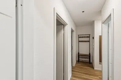 Ein Bett oder Betten in einem Zimmer der Unterkunft Skyview Apartment mit Balkon & Parkplatz