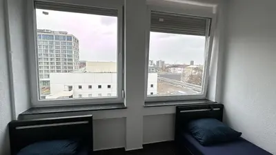 Ein Sitzbereich in der Unterkunft Hotelikum zentreal Bequem