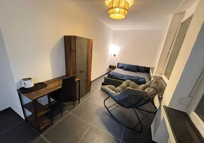 Ein Sitzbereich in der Unterkunft Hotelikum zentreal Bequem