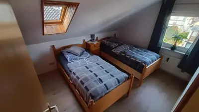Ein Bett oder Betten in einem Zimmer der Unterkunft Schöne helle Wohnung für 2 Personen