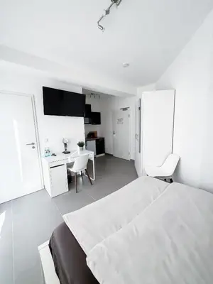 Ein Bett oder Betten in einem Zimmer der Unterkunft Durdi - Serviced Apartments - 24h Self-Check-in & Parking