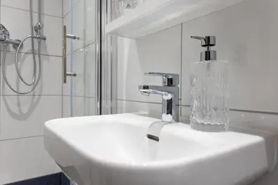 Ein Badezimmer in der Unterkunft Schloss Höfingen