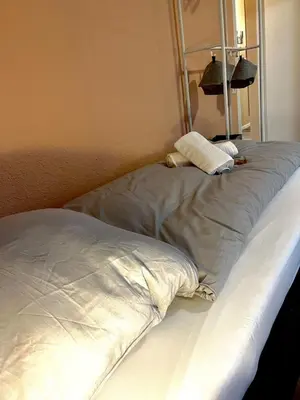 Ein Bett oder Betten in einem Zimmer der Unterkunft Pixies First - Ihr Wohlfühl-Apartment