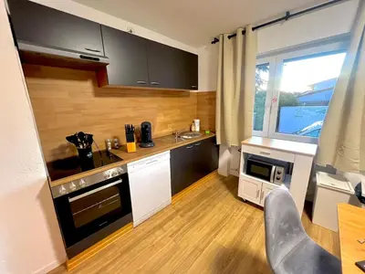 Küche/Küchenzeile in der Unterkunft Pixies First - Ihr Wohlfühl-Apartment