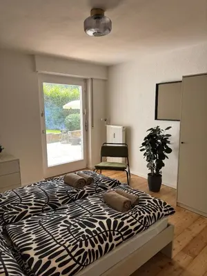 Ein Bett oder Betten in einem Zimmer der Unterkunft Cozy apartment with a Black Forest view
