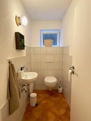 Ein Badezimmer in der Unterkunft Cozy apartment with a Black Forest view