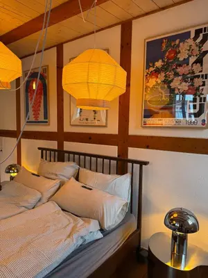 Ein Bett oder Betten in einem Zimmer der Unterkunft Herzstück 1526 - Ihre Ferienwohnung im Fachwerkhaus direkt in der Altstadt