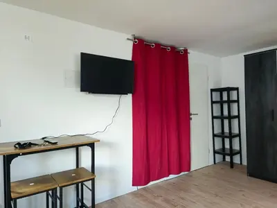 TV/Unterhaltungsangebot in der Unterkunft Modern Appartement near city of Darmstadt