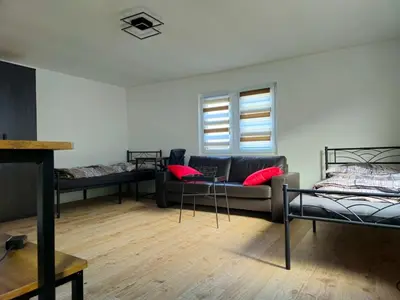 Ein Bett oder Betten in einem Zimmer der Unterkunft Modern Appartement near city of Darmstadt